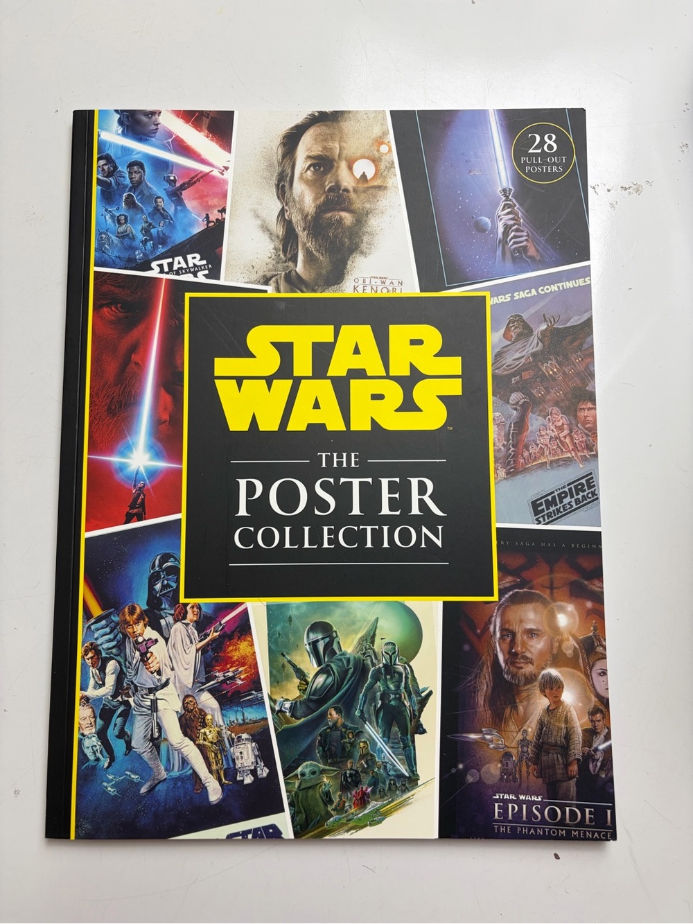 Star Wars The Poster Collection includes 28 iconic pull-out posters